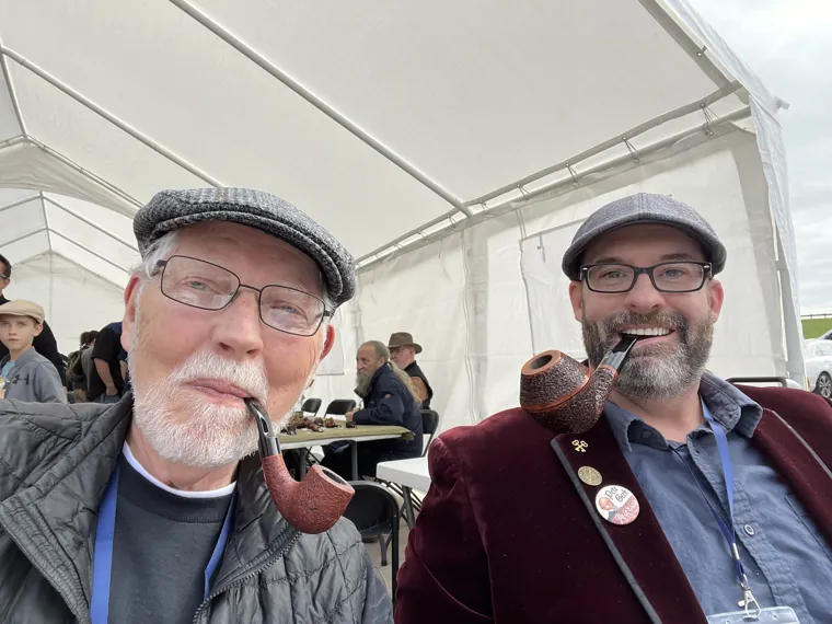 Members with their pipes at an outdoor event